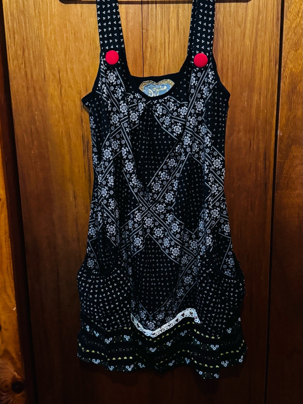 Scrapbook Black Mini Dress with Red Button Accents